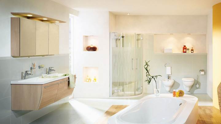 White Bathtub And White Interior In Bathroom